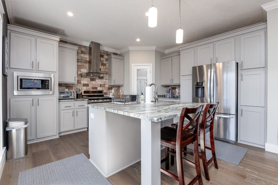 full kitchen with large pantry