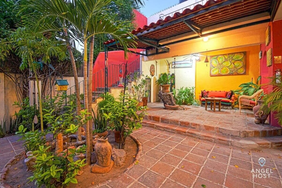 Step outside and relax in this charming garden space—ideal for a peaceful morning or evening.