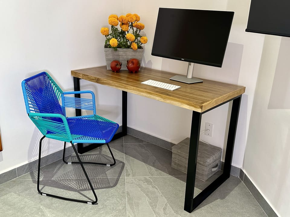 Charming 3rd bedroom w/ queen-size bed, new mattress, closet, desk, & smart TV.