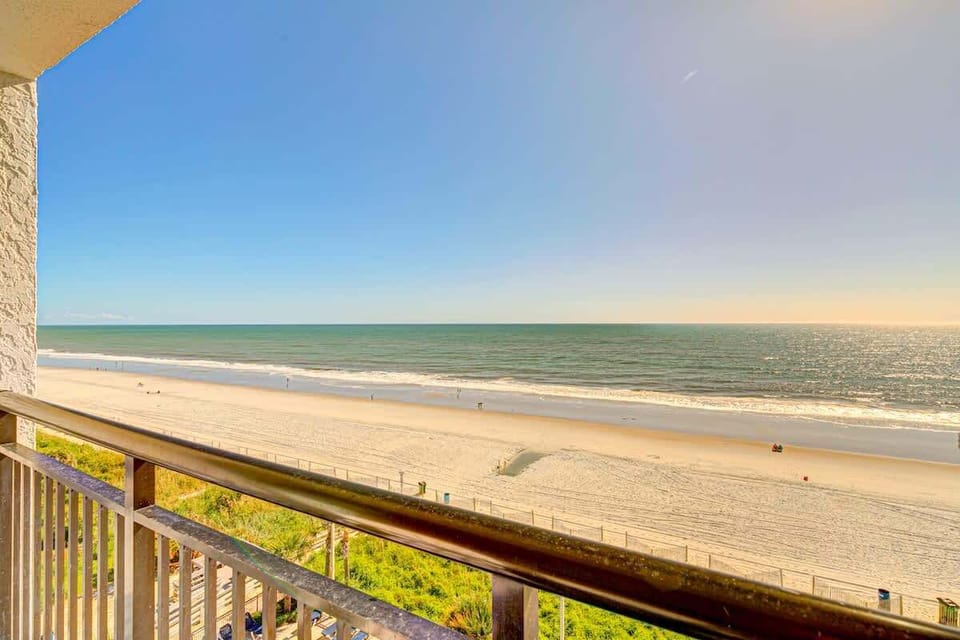 Wake up to ocean whispers and vibrant sunrises on your private balcony at the heart of Myrtle Beach.