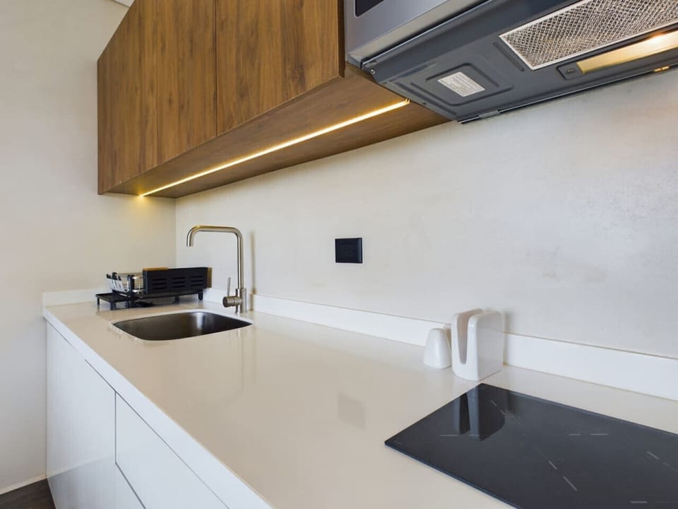 Spacious kitchen: ample counter space, storage & stocked cooking essentials!
