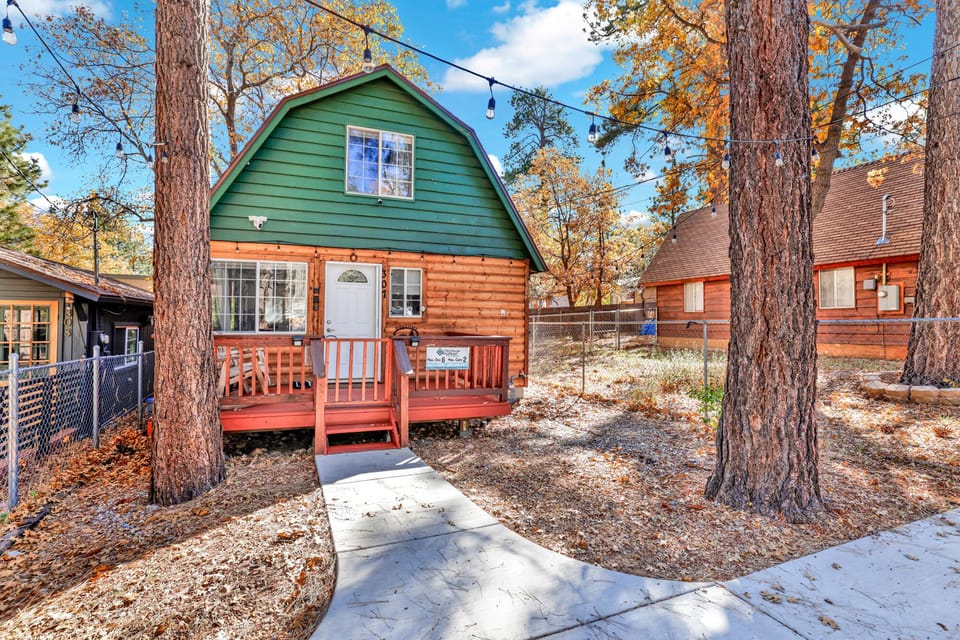 Step into a charming A-frame cabin with true big bear character, your cozy stay near laundry facilities, local bar and grill, skate park, and hiking trails.