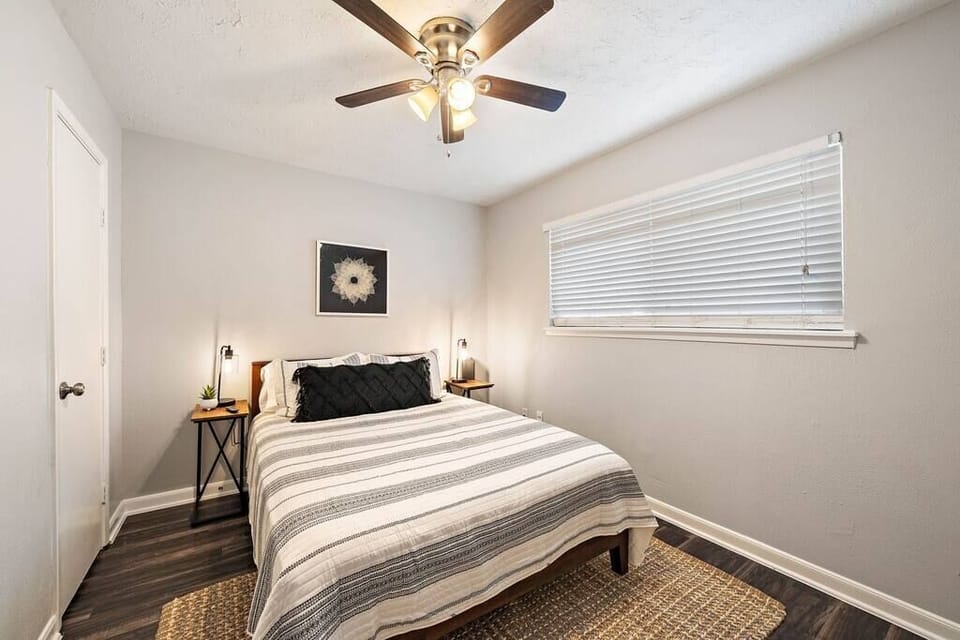 Bedroom Retreat: Bright and airy space with modern decor, perfect for relaxing after adventures.