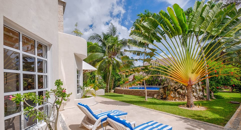 Lush Gardens and Pool Area