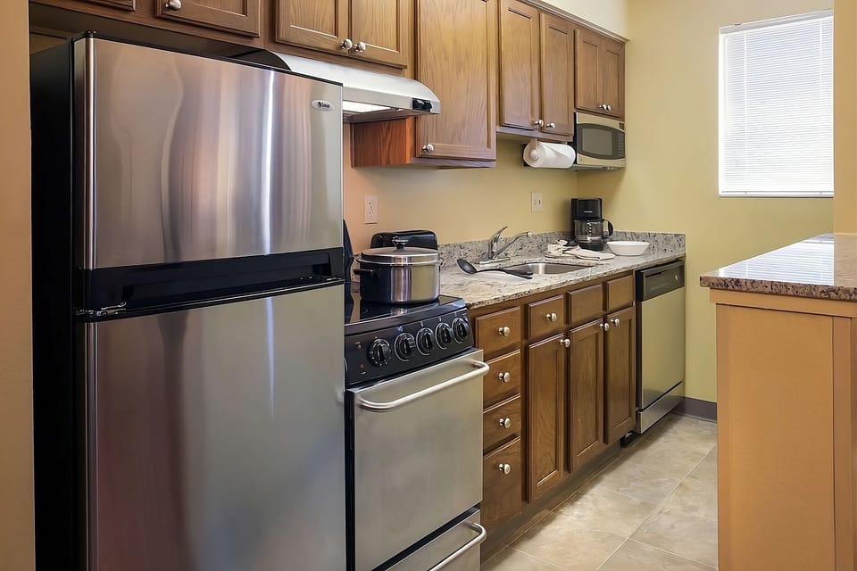 Cook easy meals with full kitchen essentials and ample counterspace.