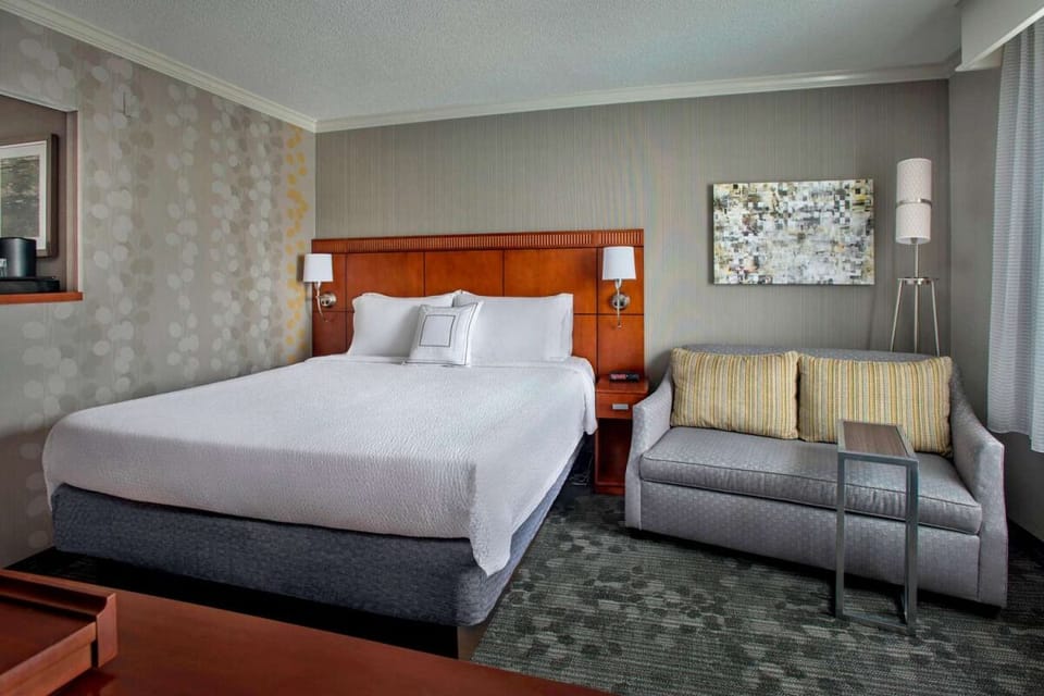 Stretch out in a bright room designed for easy relaxation.
