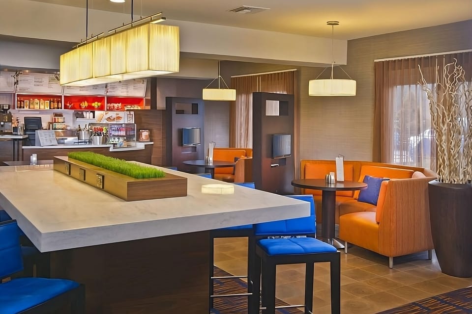 Gather for cocktails and conversation in a stylish bar lounge.