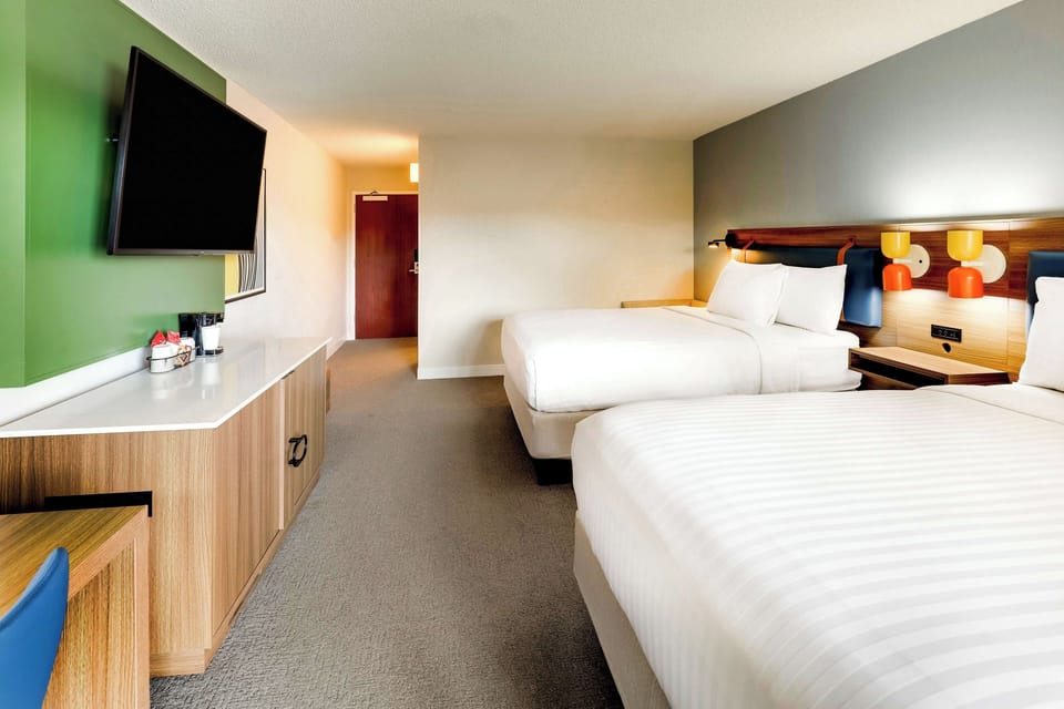 Kick back after adventures with big-screen viewing from bed.