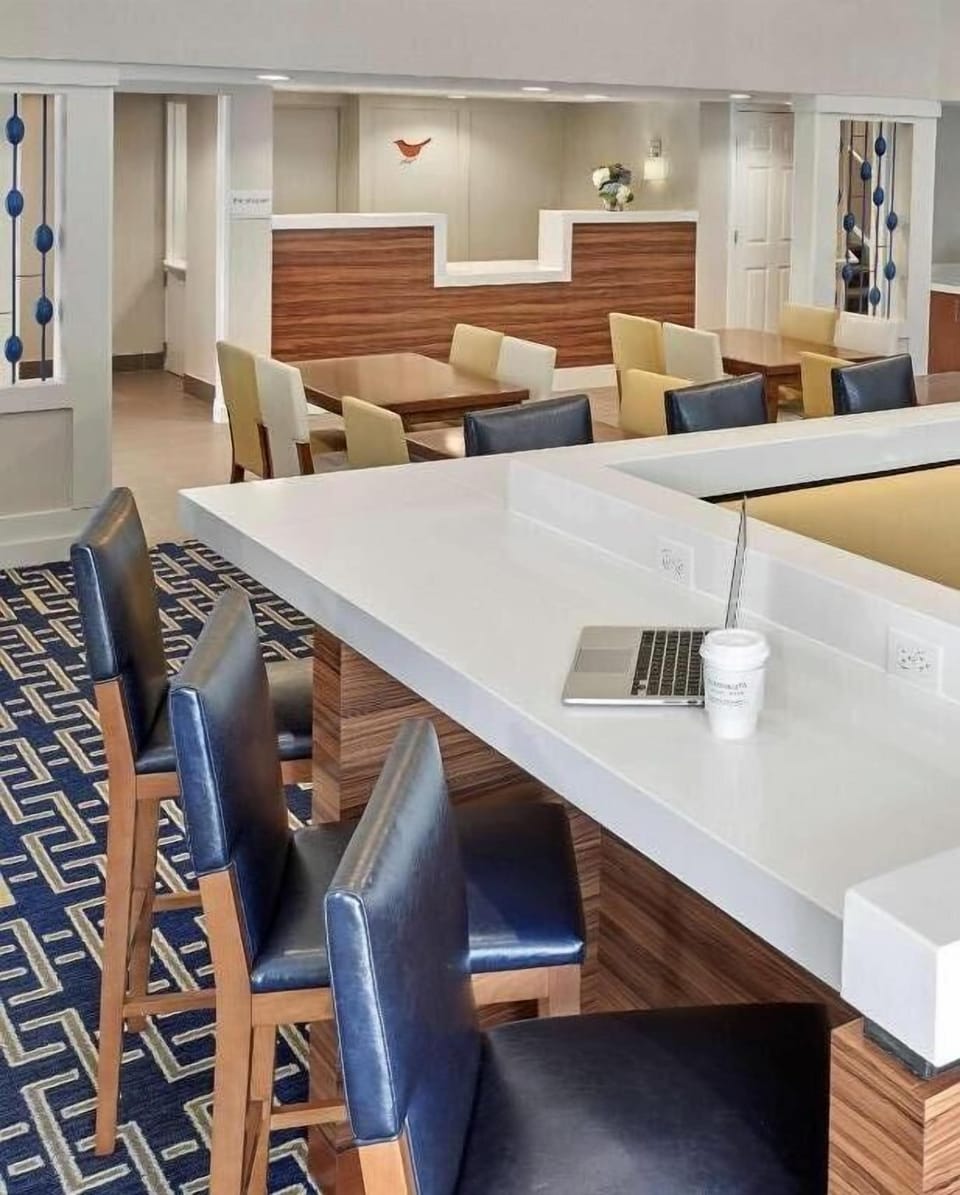 Get things done at the spacious work tables and charging points.
