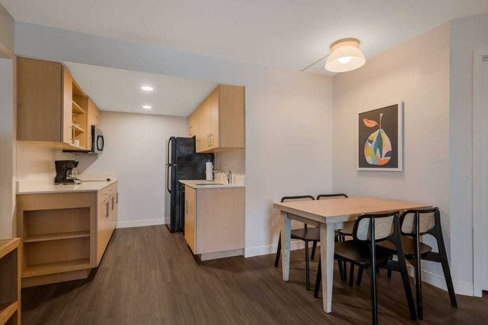 Gather for easy meals in a bright, modern kitchenette.