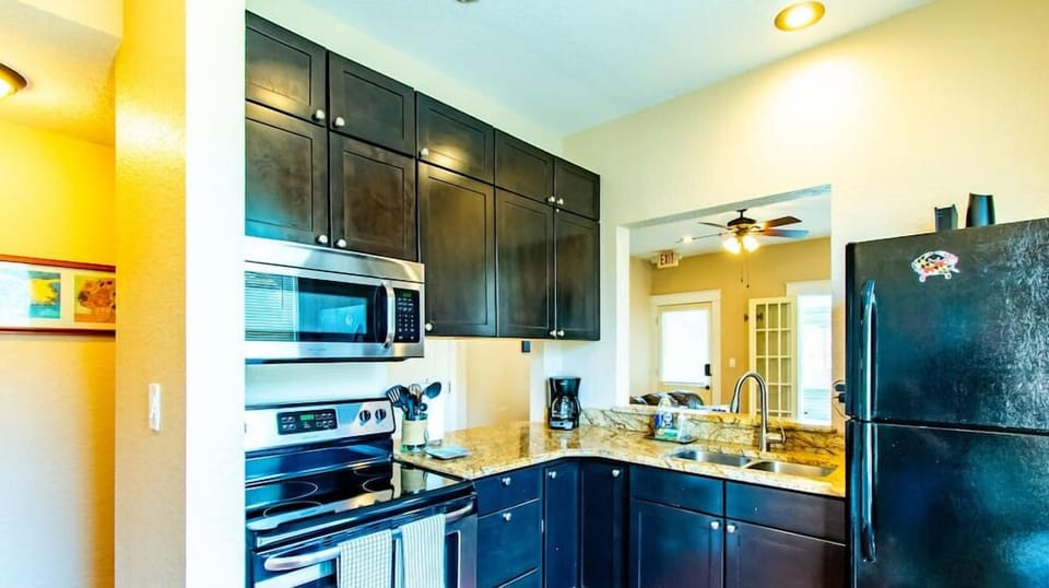 A perfect kitchen is more than just good looks; equipped with essential appliances such as a refrigerator, oven, microwave, and dishwasher,have elegant shelves and cabinets for storage..

