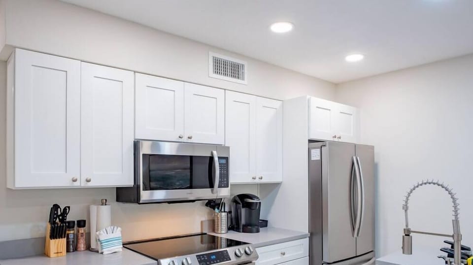 Newly remodeled, all new stainless steel appliances and deep basin sink placed in the generous island great for cooking, eating leftovers, delivery, or takeout from the resort's on site restaurant or restaurants next door