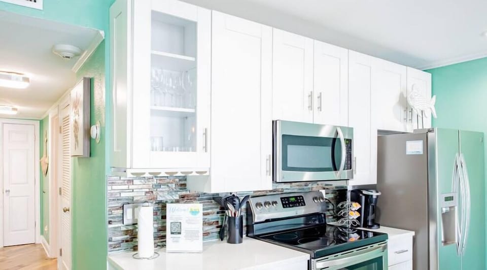 Easy to make dinner in a kitchen with lavish attention to detail including stainless steel appliances, stovetop, and microwave...or bring back leftovers from the resort's Tiki Bar or any of the conveniently located Tampa local restaurants and bars.