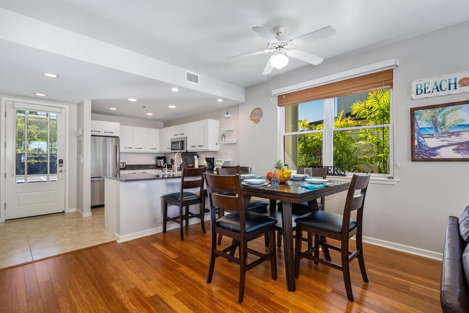 Dining area with seating for four and breakfast bar
