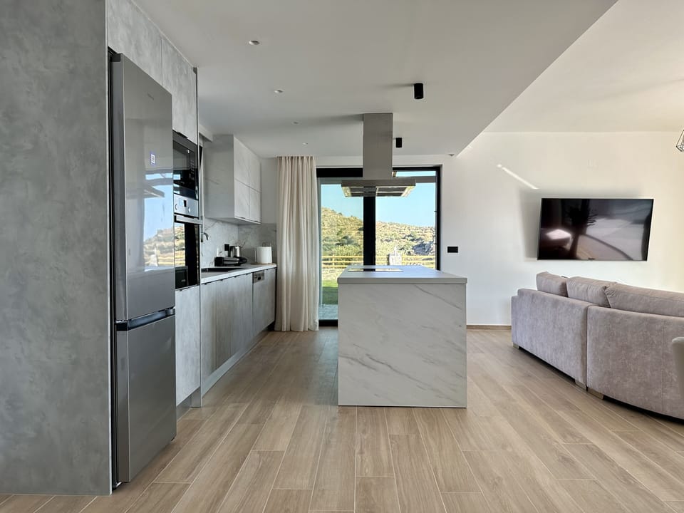 A large kitchen with easy access to terrace!