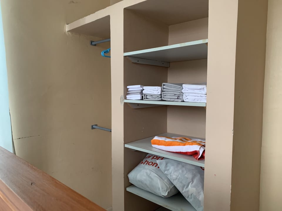 The Master suit has got its own cabinet for folded and hanging clothes