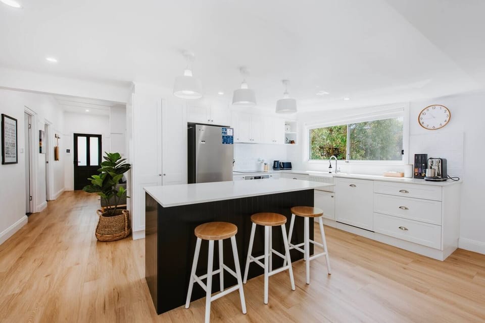 A gourmet kitchen makes it easy to whip up a feast with sleek appliances and cooking utensils, along with a dishwasher for easy clean up.
 
