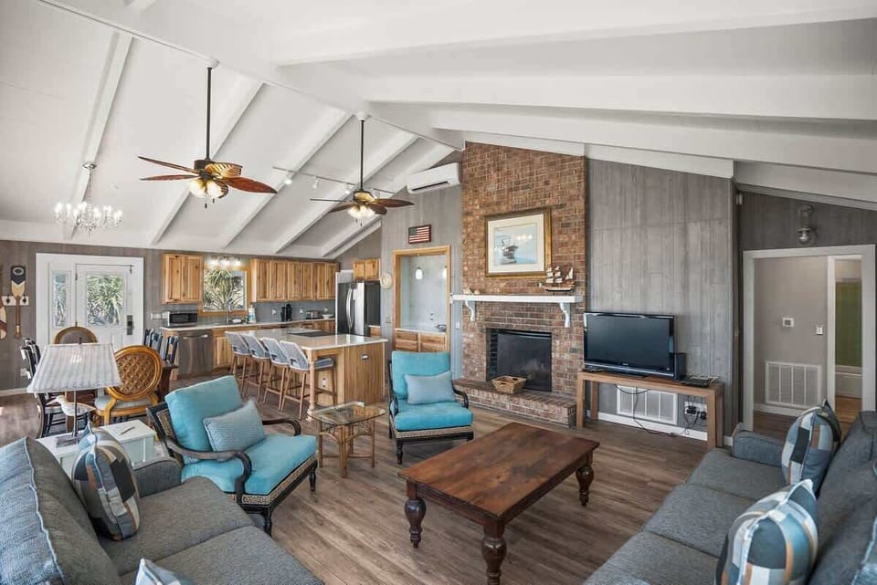 Living Room, Kitchen, Dining Area Open Concept. Fireplace is for Guest Use (Firewood not provided)
