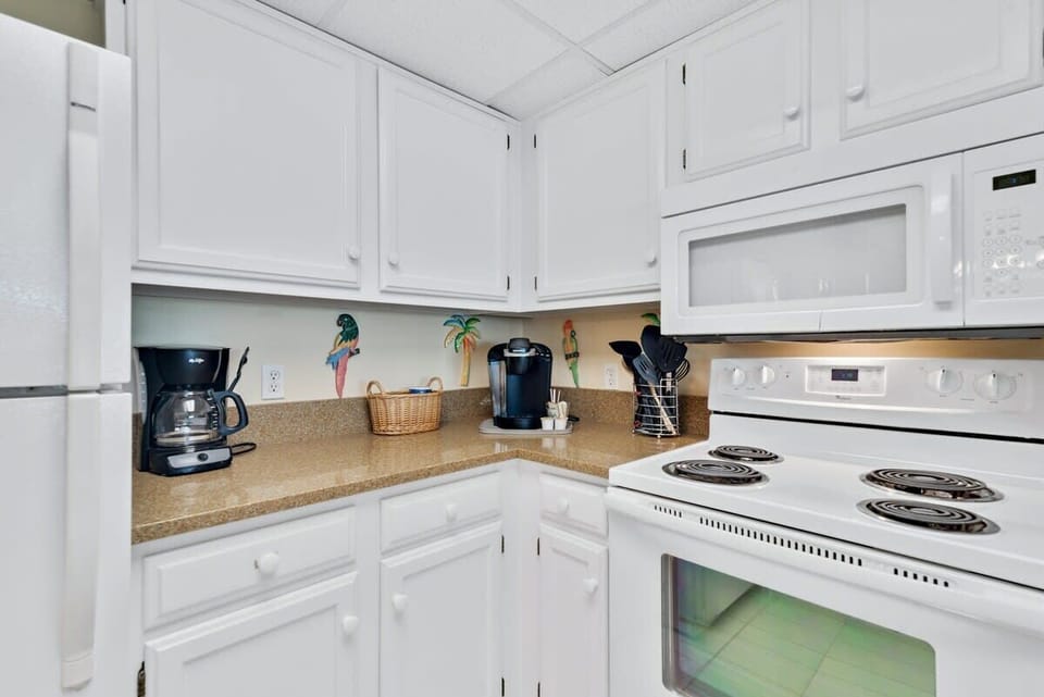 A regular coffee pot and a Keurig in this condo. 