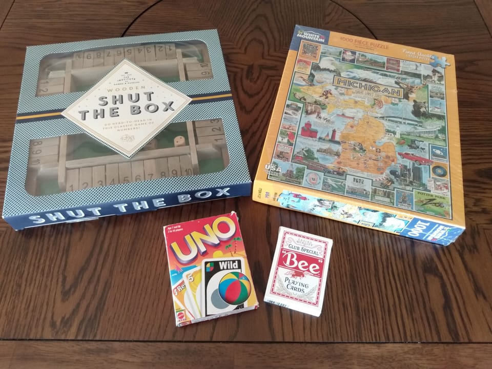 Have fun inside with board game Shut the Box, jigsaw puzzle, Uno, or play cards.