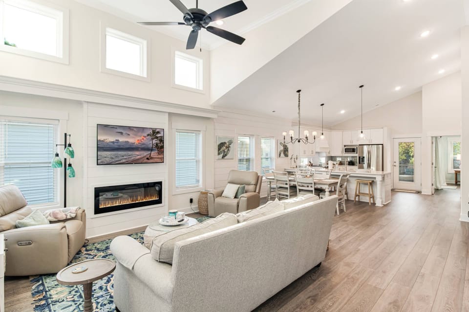 Enter & see the Open Plan Living/Dining/Kitchen & feel the Coastal Sophistication of this stunning vacation home.