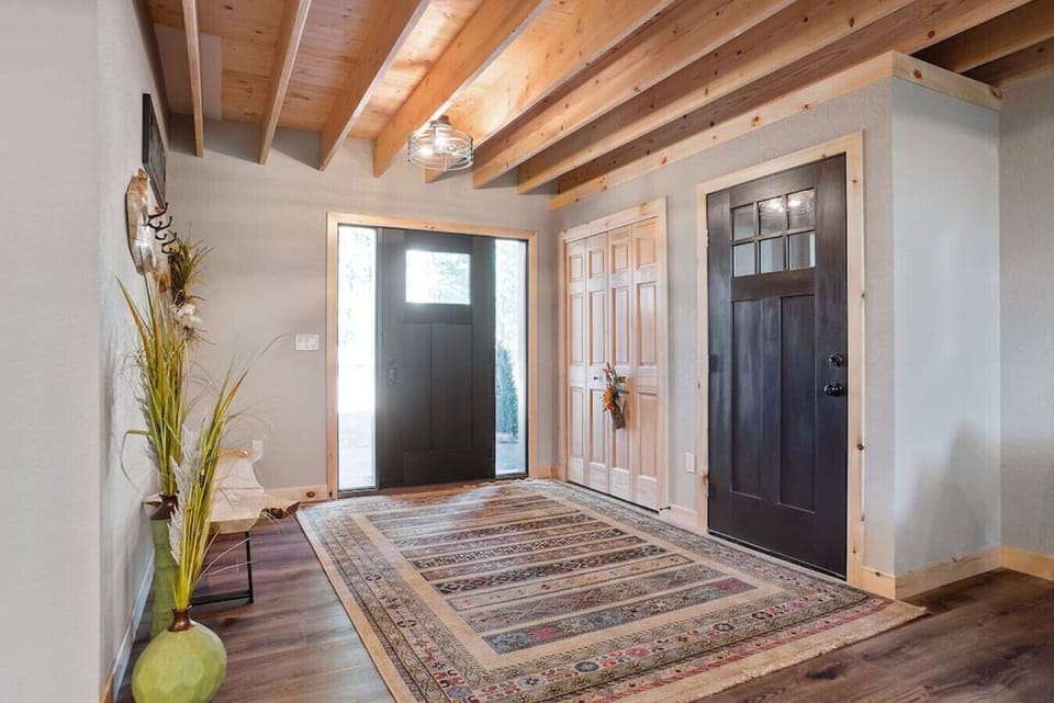 The cabin entrance adorned with beautiful decorations, creating an inviting and charming first impression.