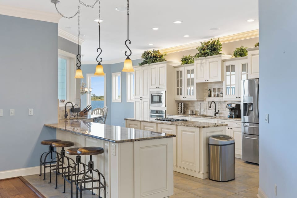 Fully Equipped Kitchen + Breakfast Bar Seating for Four