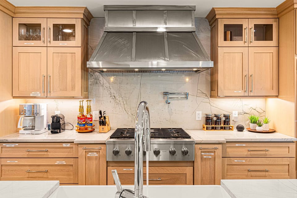 Fully stocked gourmet Kitchen open to two huge great rooms