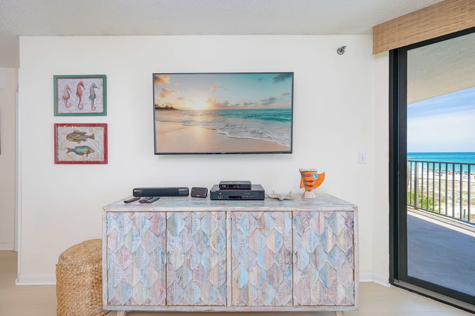 Unwind after a day at the beach in this cozy living space with a good movie or your favorite show