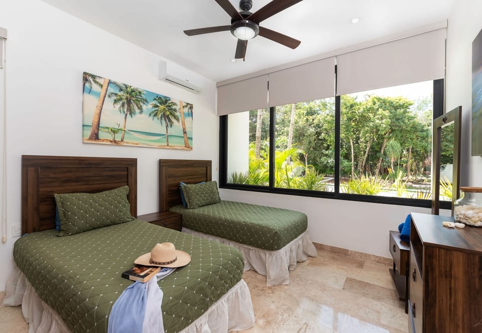 3rd bedroom with 2 twin beds or slide together for a massive bed