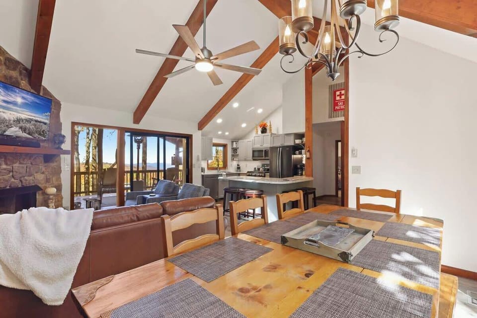 Host delightful gatherings for family and friends at the dining table with seating for eight in the adjoining dining room