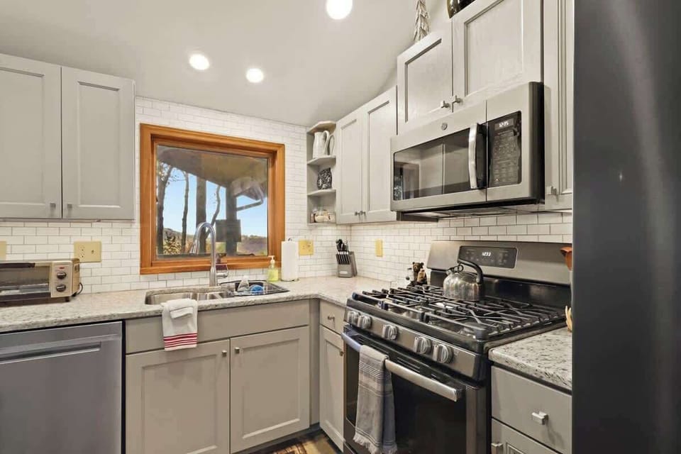 Discover the convenience of a fully equipped kitchen, where every culinary need is met with modern appliances and ample space.