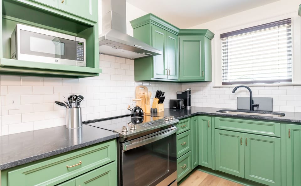 Sleek and modern full kitchen has everything you need