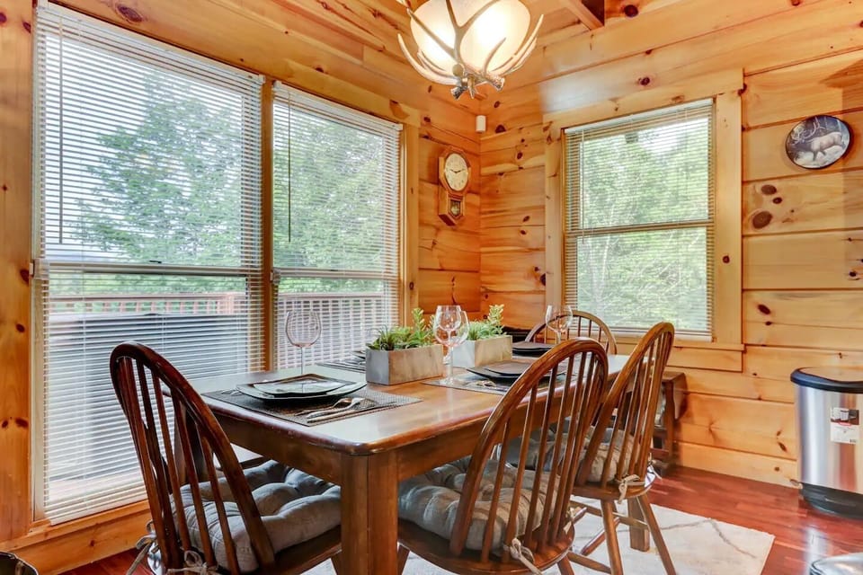 Dining area with tasteful light fixtures and decor