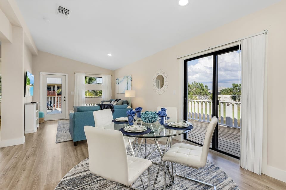 Open concept living at its finest with a dining area next to the living area.