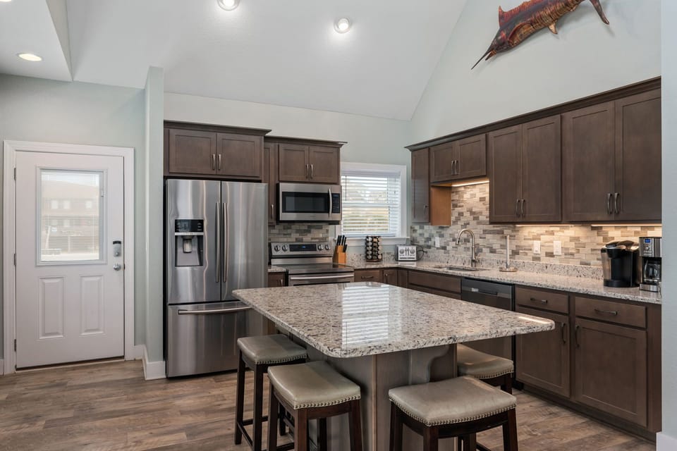 NH387A: Bodie Island Cottage | Kitchen Area- Island Seating for 6