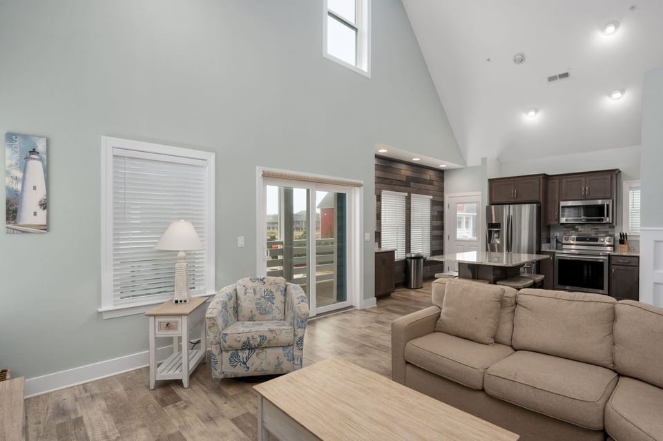 NH387B: Ocracoke Cottage | Living Room Area- Deck Access