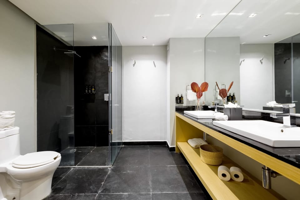 Opulent bathroom with a spacious shower area.


