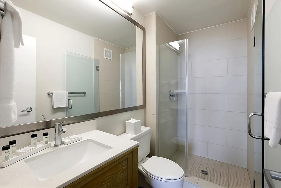 Start your morning with bright lighting and a sleek vanity.