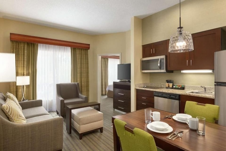 Relax in the open suite with lounge and kitchenette nearby.