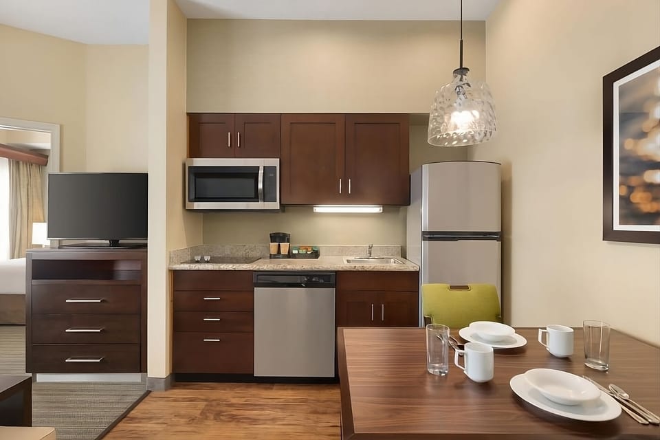 Sip morning coffee beside a convenient in-suite kitchenette.