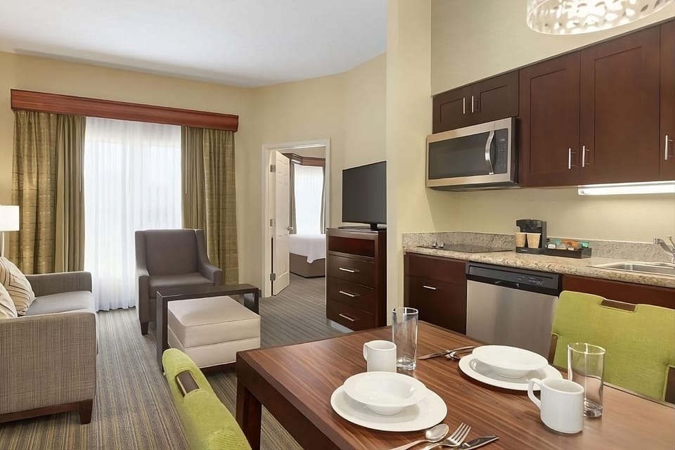 Gather together in an airy suite with kitchenette convenience.