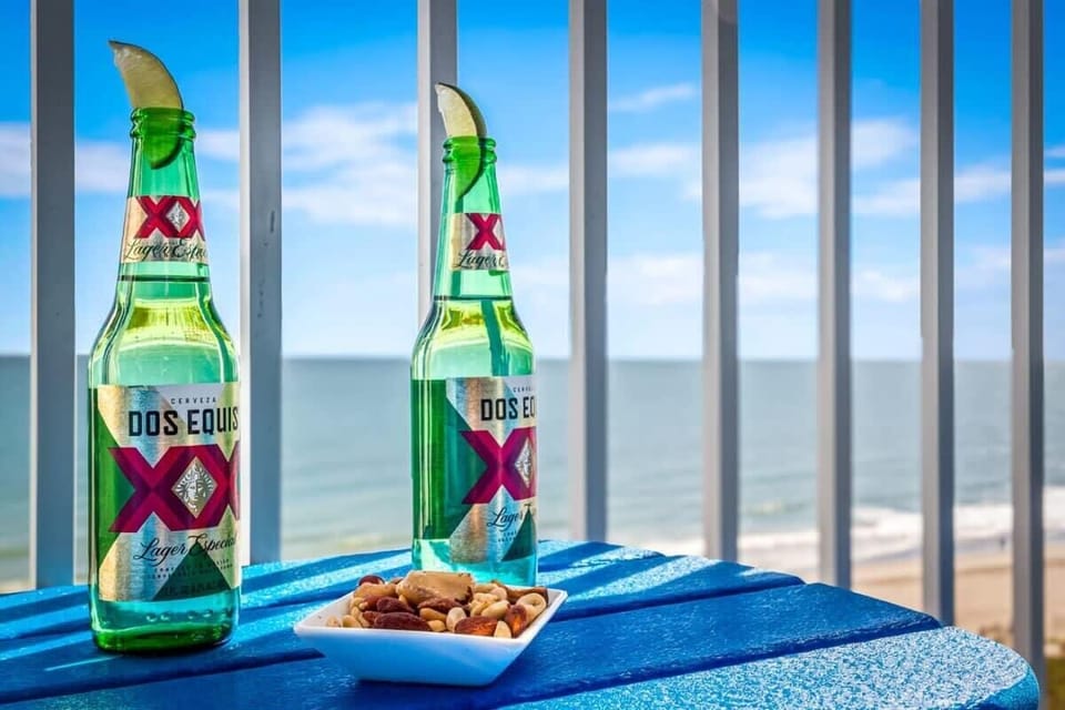 Cheers to breathtaking ocean views! Savor refreshing drinks and snacks on your private balcony as the sea breeze and endless blue horizon set the perfect vibe for your getaway.