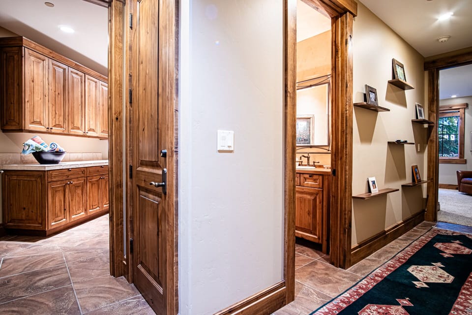 Hallway view to Laundry Room and Half Bath