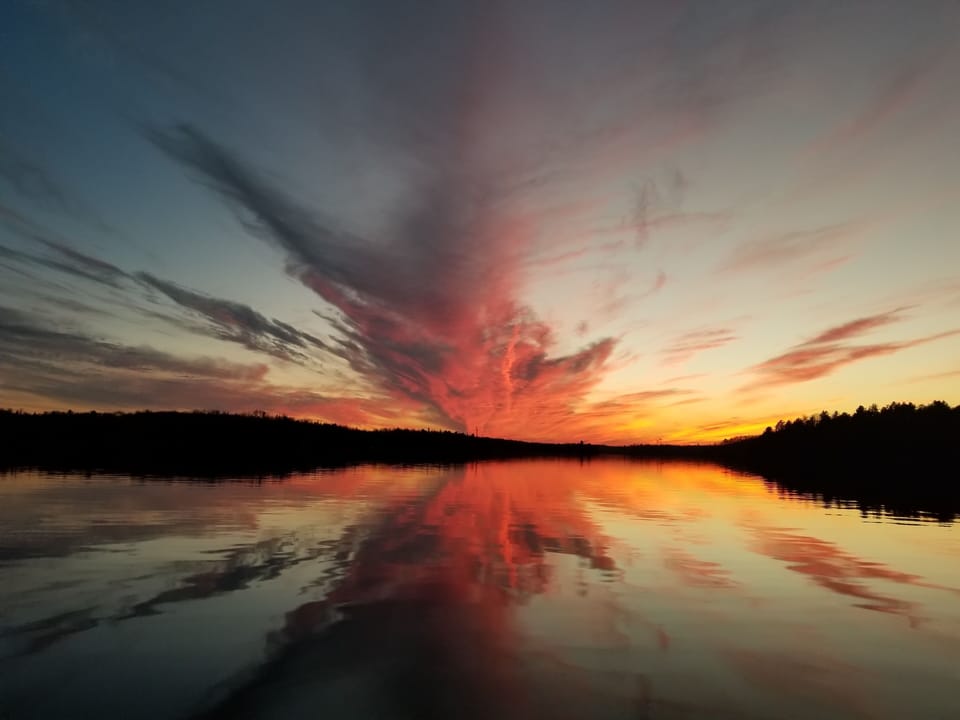 One of many spectacular sunsets on Lake Nepewassi.