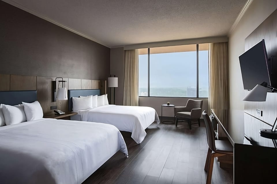Settle into a spacious double room with soothing natural light.