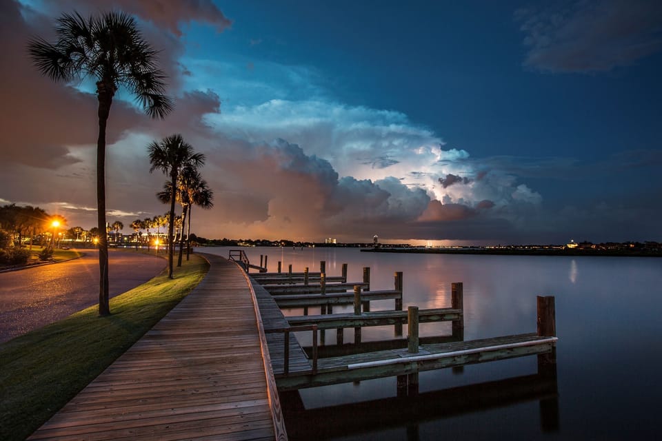 Unwind on the waterfront boardwalk as sunsets paint the sky.