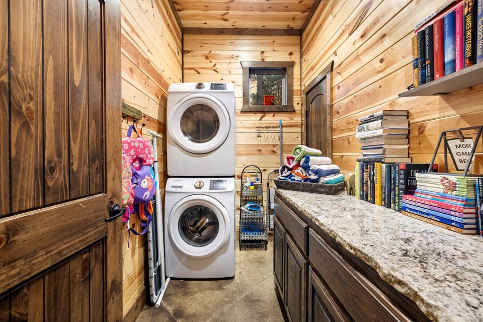 Full sized washer/dryer with life jackets, a small library and plenty of games