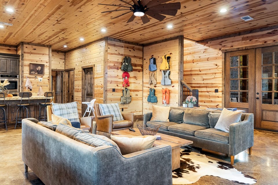 Back patio doors with nearby staircase to upstairs adventures