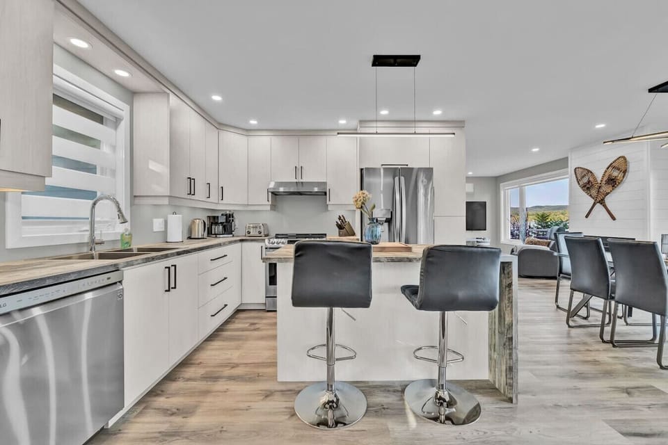Stylish and functional cooking space with ample storage and modern design.